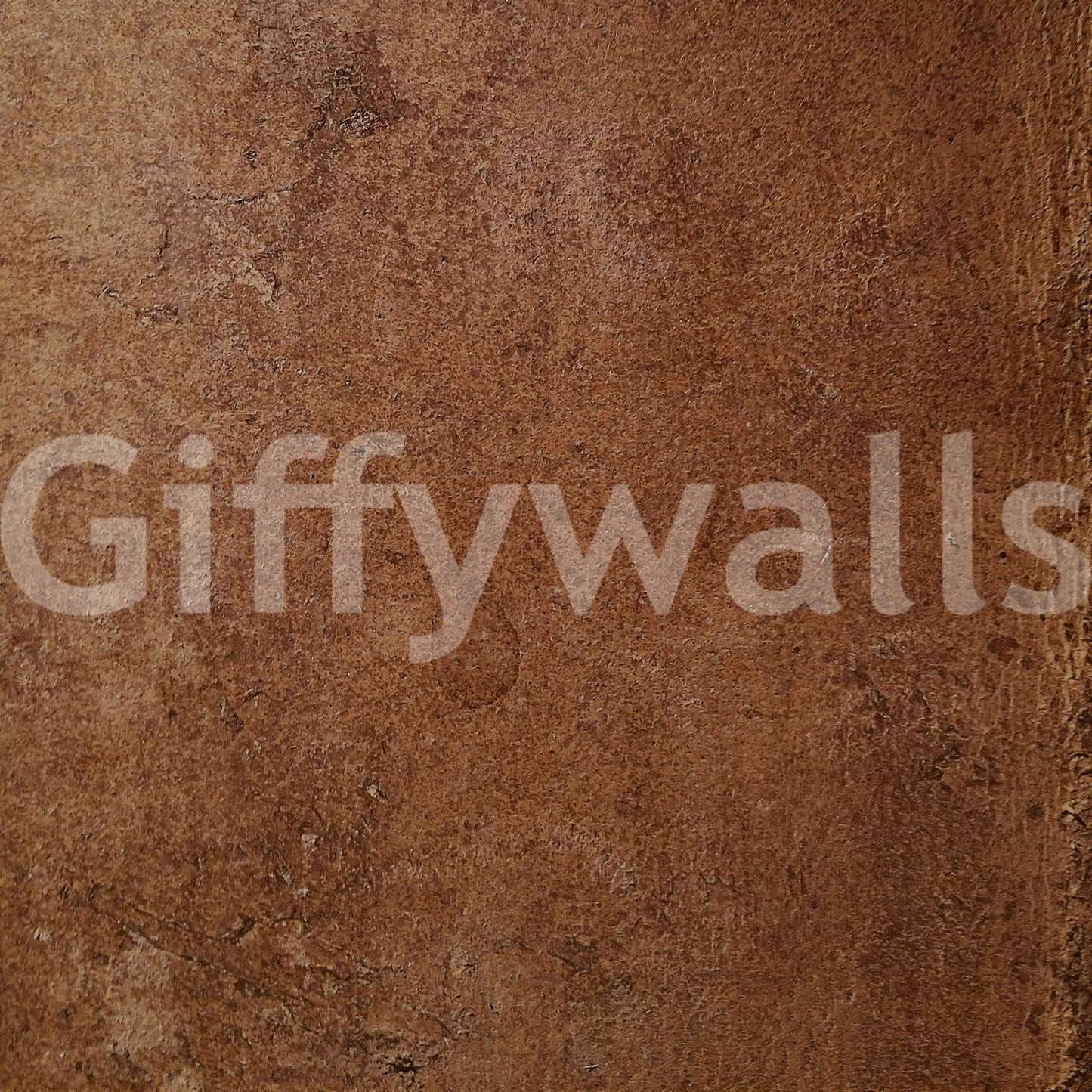 Aged Leather Saddle wallpaper mural close-up showing the pattern detail of caramel saddle-brown leather grain with worn patina