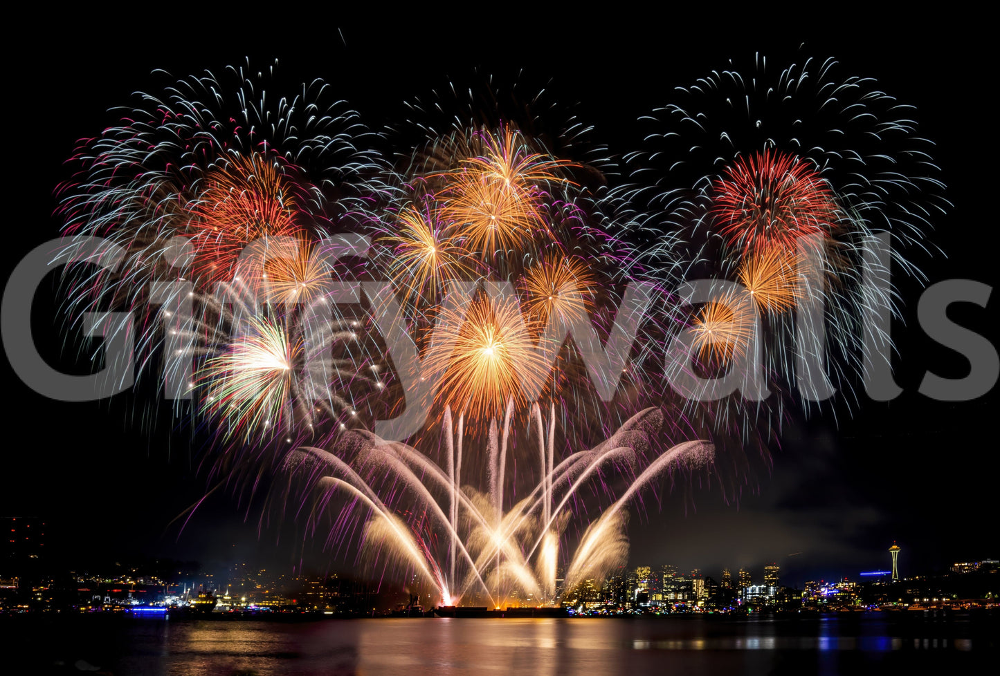 City Light Sparkle wallpaper mural showing colorful fireworks bursting over a night city skyline reflected on the water