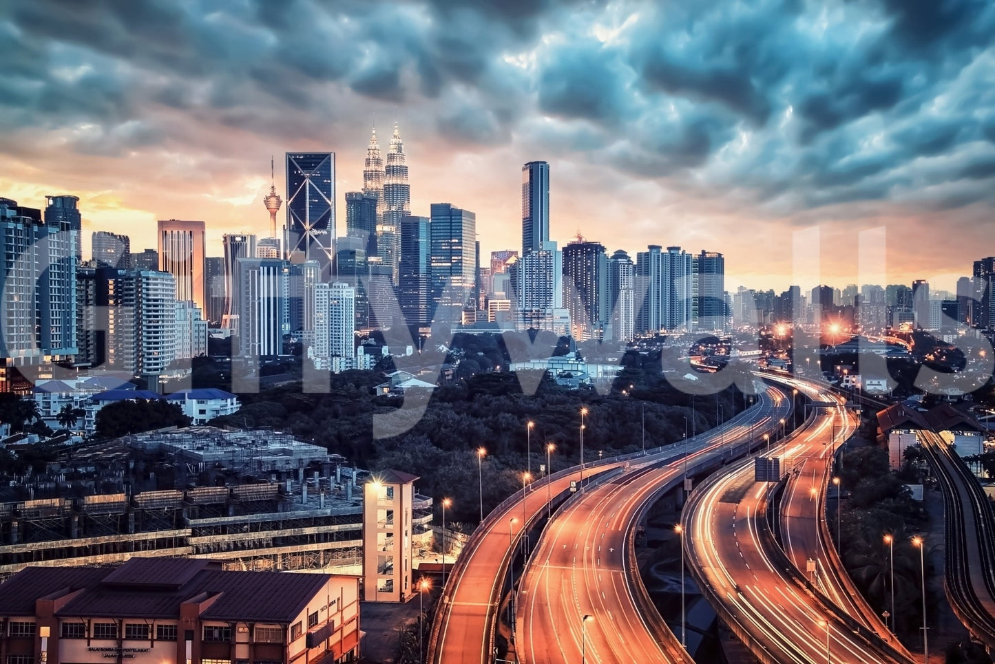 Cityscape Dawn wallpaper mural shown as a full-wall view of Kuala Lumpur skyline with red highway light trails at dusk