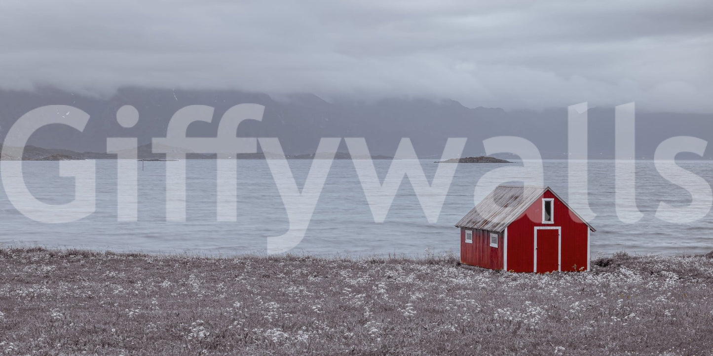 Red cabin by the water wall mural adding rustic elegance to your home.