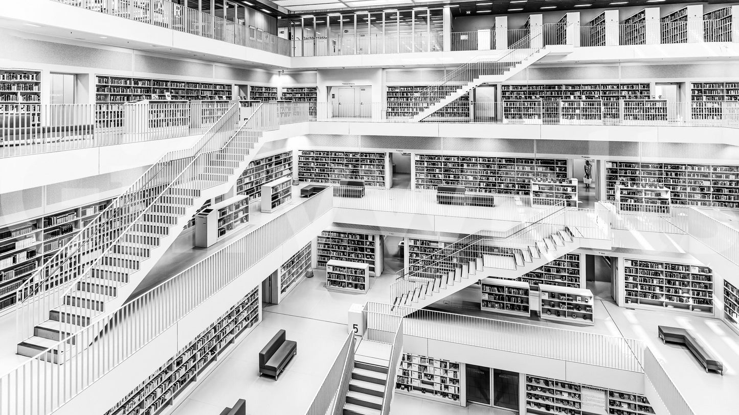Monochrome Library wallpaper mural showing a grand multi-level library with white staircases and book-filled balconies