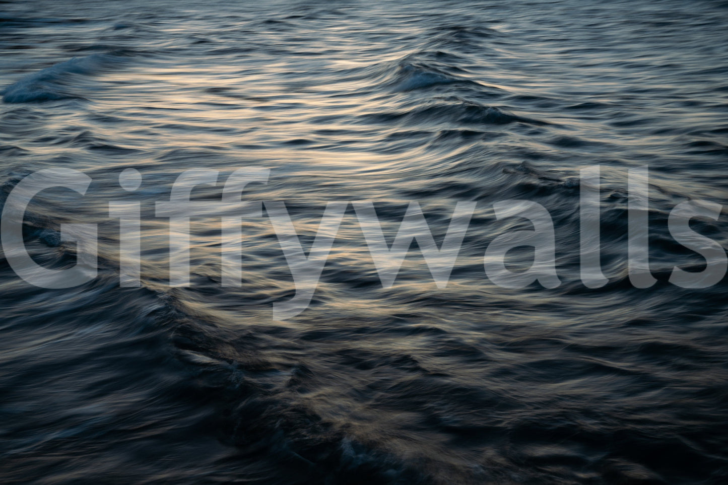 A detail of the dark tones in the water and shore.