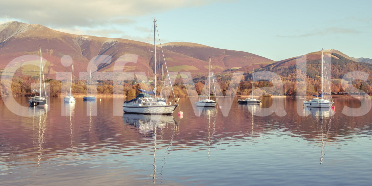Calm lake scene with boats wallpaper design