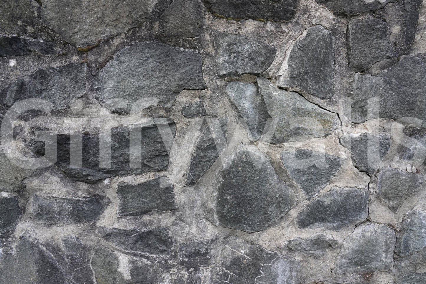 Stone Facade wallpaper mural close-up showing the grey fieldstone rubble masonry pattern detail