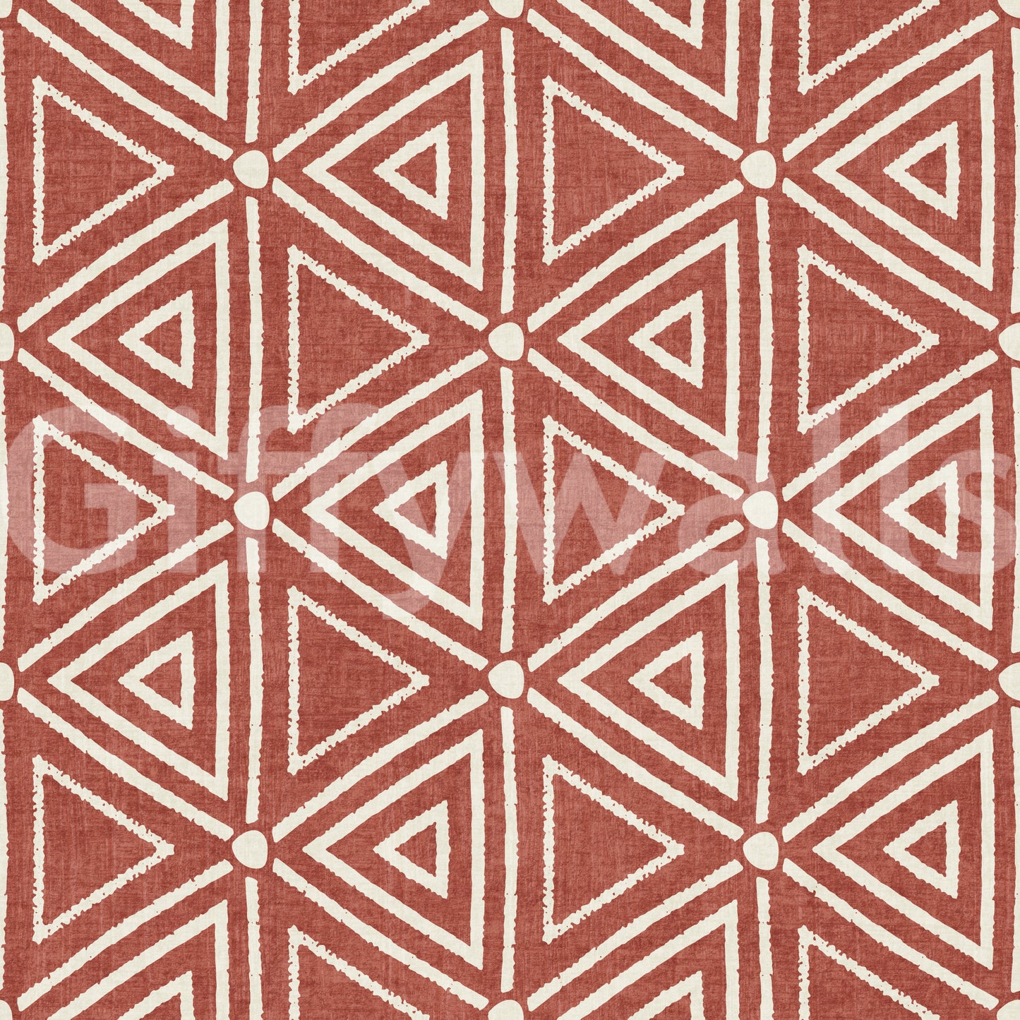 Block-stamped tribal triangles forming the terracotta wallpaper pattern
