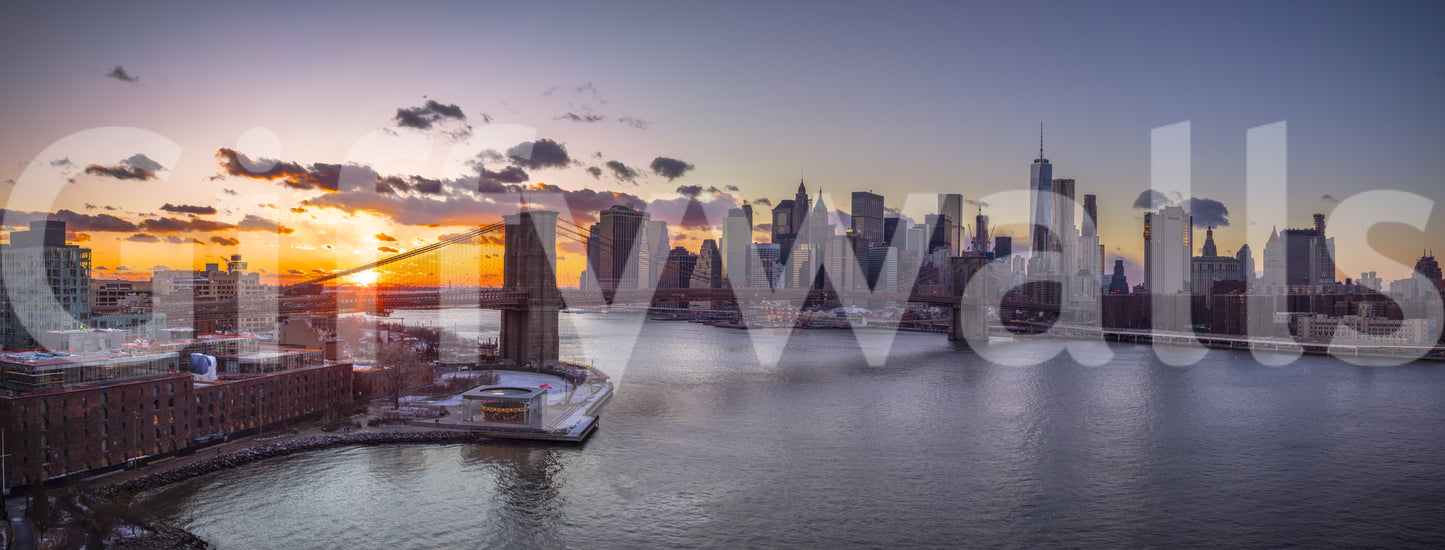 Steel blue water mirrors a burning sky for the NYC Sunset wall mural look.