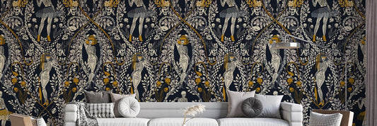 Haunted mansion Halloween wallpaper mural covering a living room feature wall with pumpkins, ghosts, and a full moon backdrop