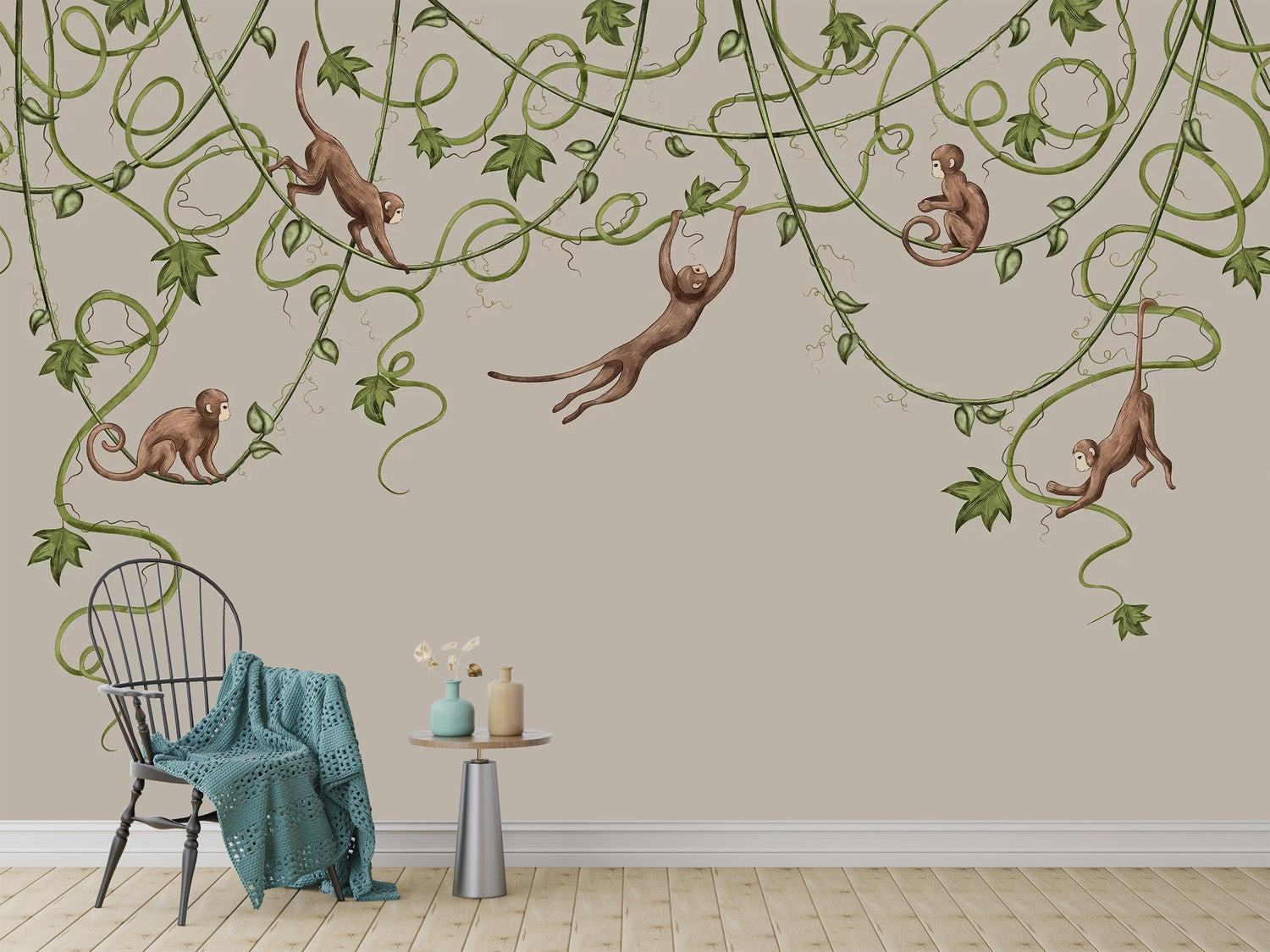 A child's playroom wall covered in a colorful monkey wallpaper with cartoon primates swinging on vines.