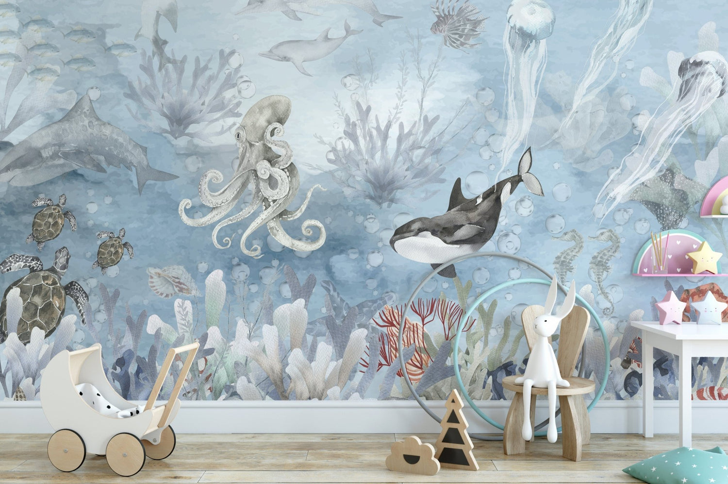 Custom sized ocean wallpaper mural showing deep blue sea waves under a soft pale sky, fitted across a feature wall as a made to measure design.
