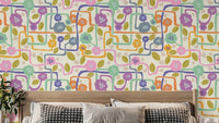 Blooming whimsy tapestry wallpaper with vibrant floral design.
