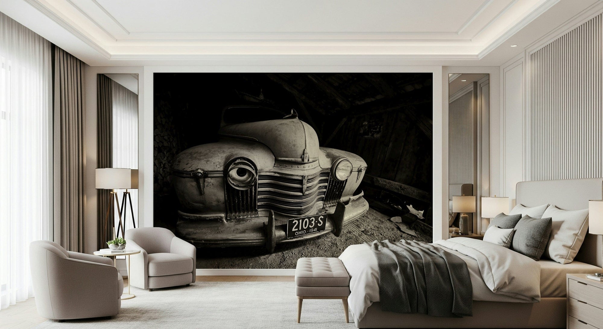 Vintage Ride: 1941 Olds wallpaper mural of a sepia classic car front in a barn behind a beige bed and armchairs