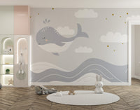 Marine life wallpaper with a playful whale