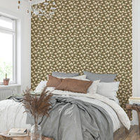 Botanical wall mural with earth haze and floral elements

