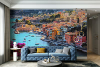 Seaside mural with terracotta roofs and rolling hills

