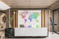 Rainbow-hued world map wallpaper for study areas

