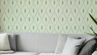 Muted green harlequin pattern wall design

