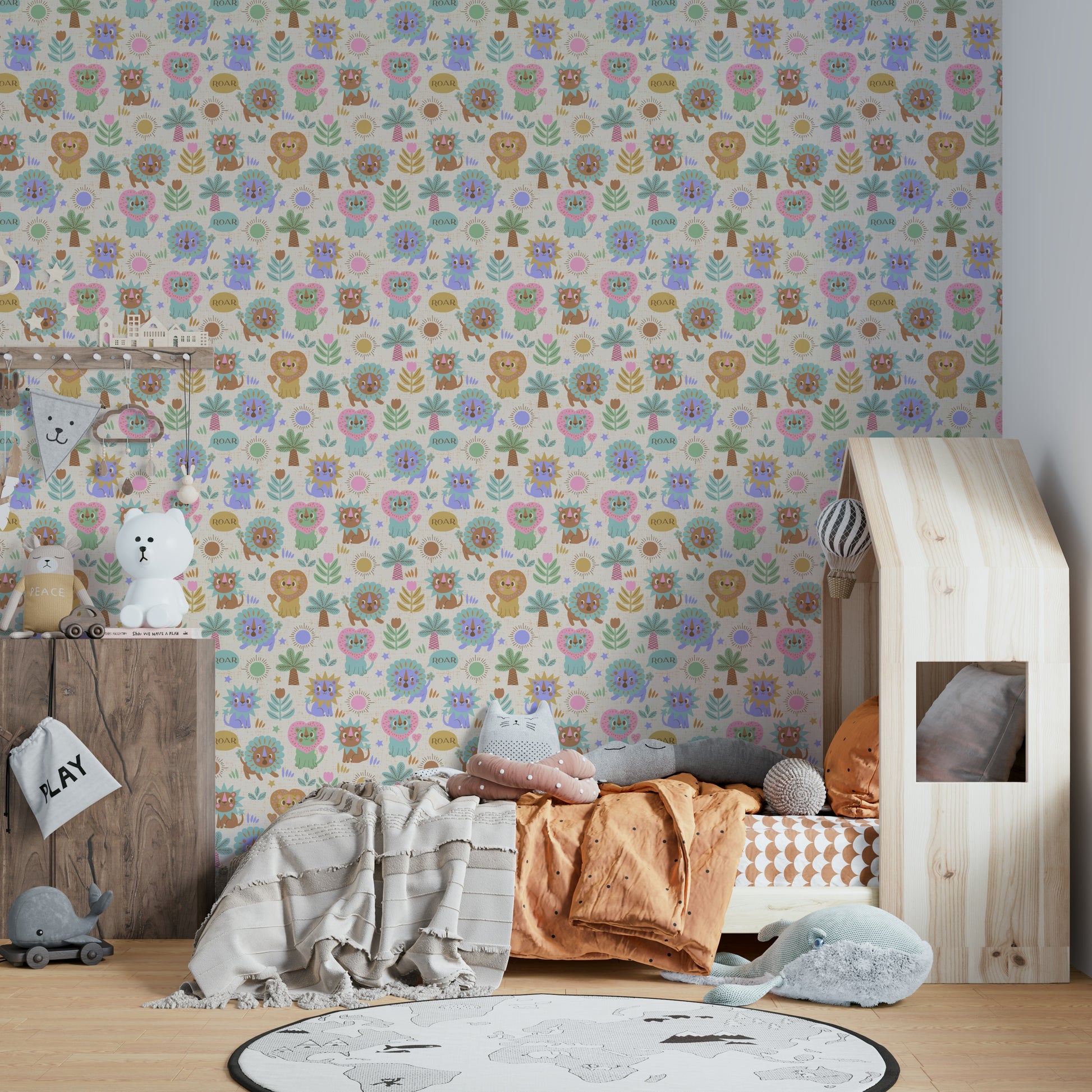 Playful lion wallpaper with a soft, cute design

