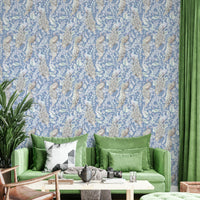Artistic peacock wallpaper in soft blue shades


