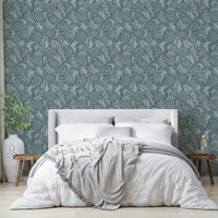 Moody blue wallpaper featuring sea kale illustrations


