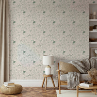 Subtle green wallpaper featuring woodland creatures

