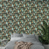 Dark green wallpaper with playful nursery design


