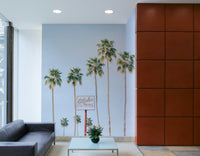 Hawaiian hotel-themed mural with ocean backdrop

