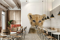 Jungle animal mural featuring baby lion cub

