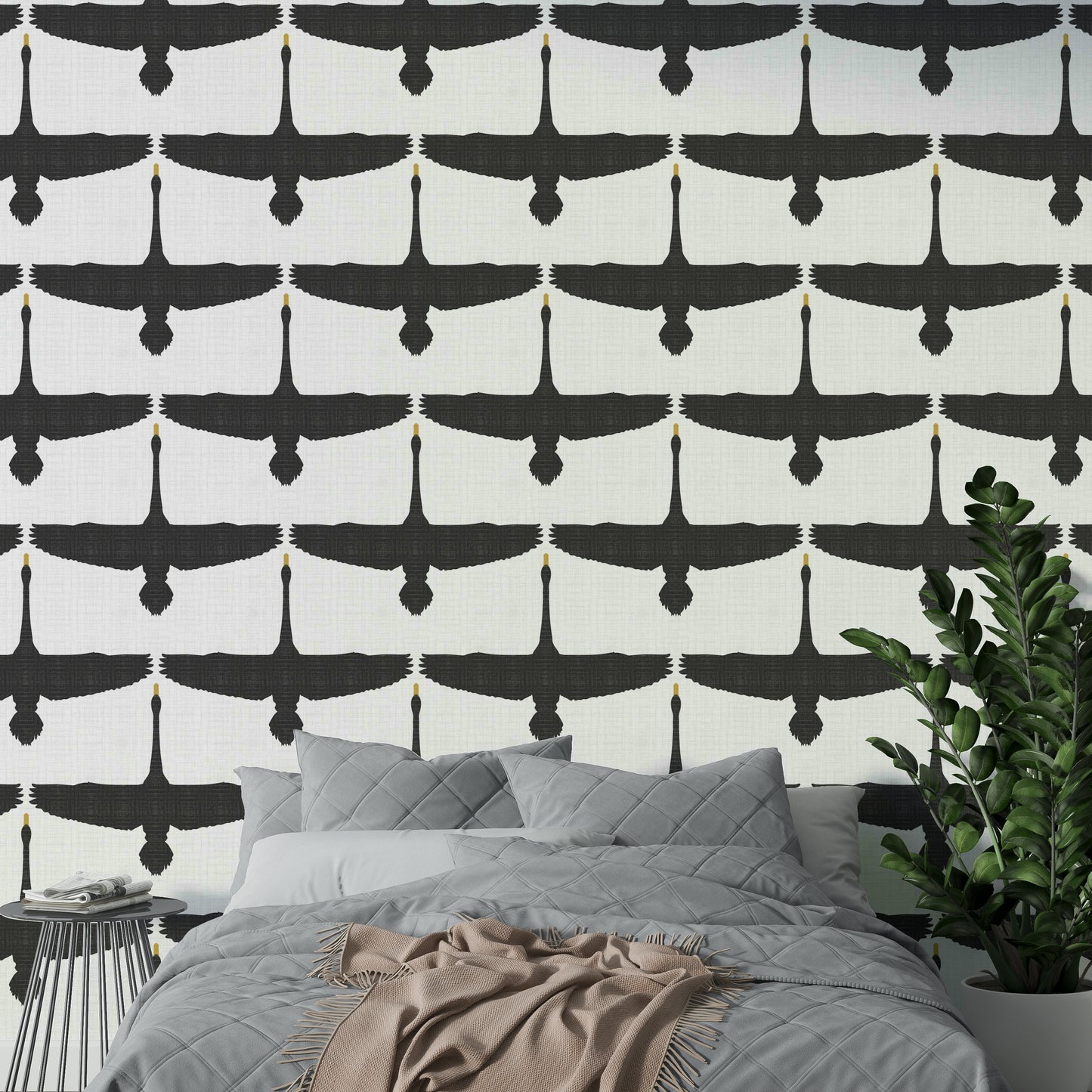 Graceful swans in motion on gray rustic wallpaper

