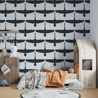 Flying swans on rustic-style gray wall covering

