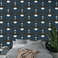 Flock of bald eagles on textured blue wallpaper

