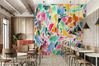 Artistic brushstrokes mural in bold vivid tones

