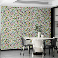 Lush green wallpaper with floral garden artwork

