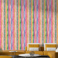 Artistic rainbow watercolor stripes on wallpaper

