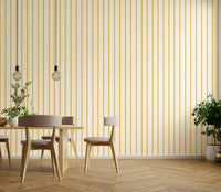 Living room styled with yellow striped wallpaper

