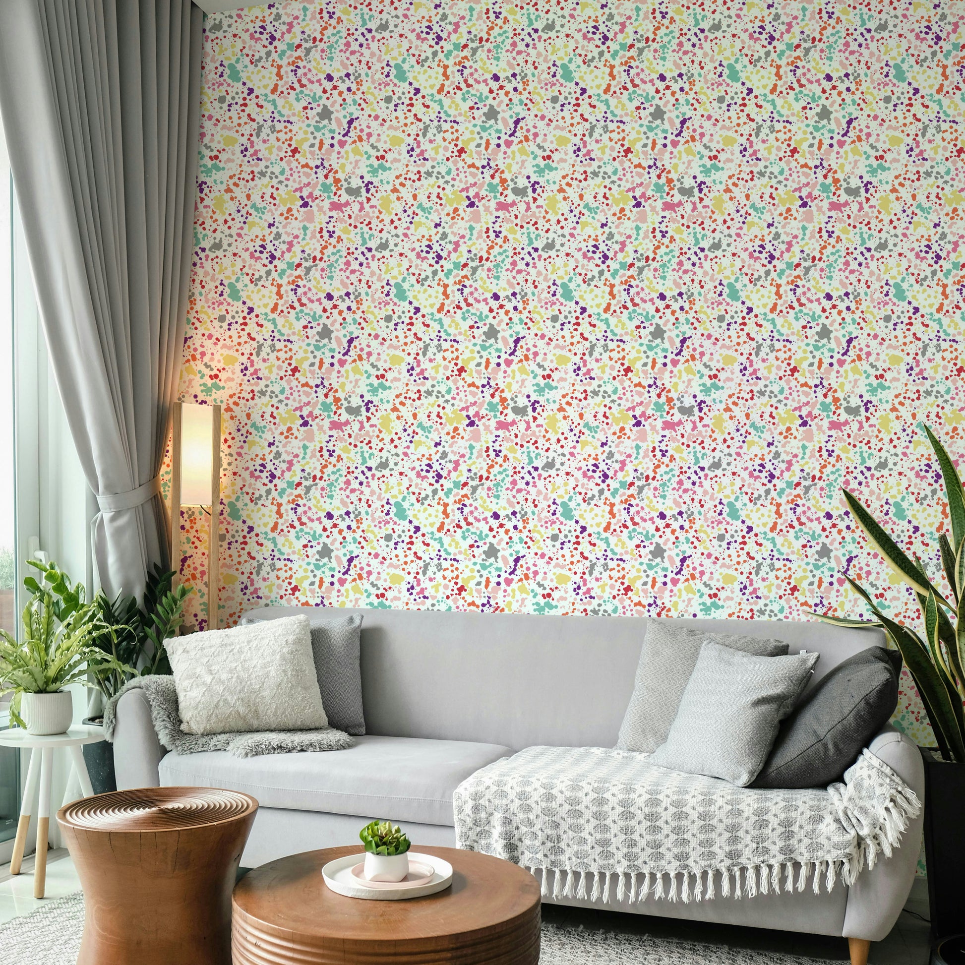 Paint splatter wallpaper with multicolored blotches

