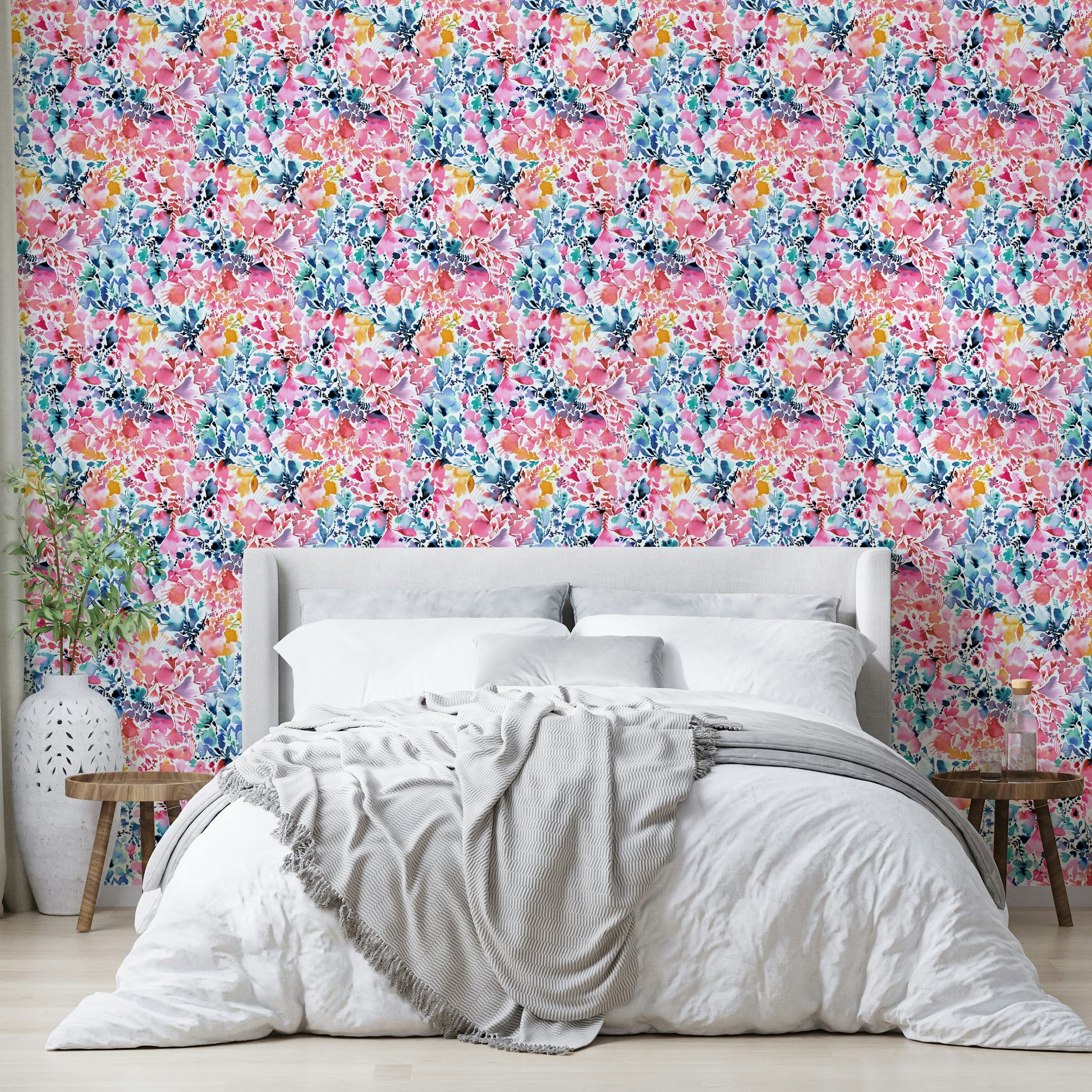 Watercolor-painted flowers on white wallpaper

