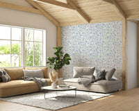 Gentle floral wallpaper with serene blue petals

