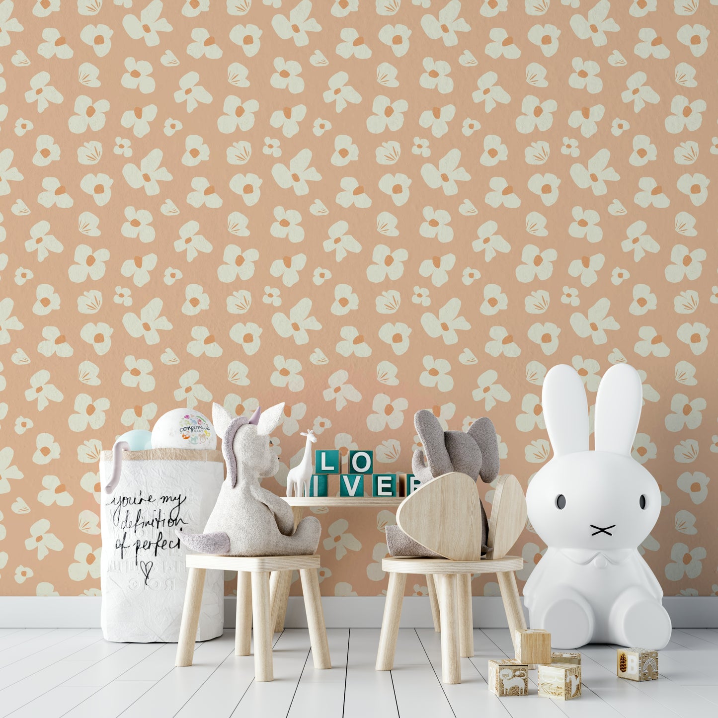 Peachy wallpaper with bold abstract flower patterns

