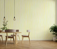 Vertical line wallpaper in pale yellow tones

