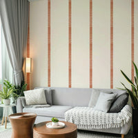 Warm boho wallpaper featuring golden stripes and terracotta hues

