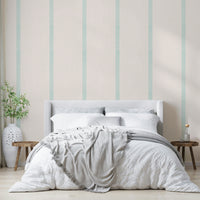 Beige and blue boho wallpaper accented with golden stripes

