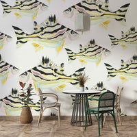Nature-inspired mural with a fish motif and dynamic oceanic patterns.

