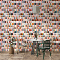 Wallpaper with matte brown and copper pattern elements.

