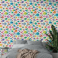 Wallpaper with sea bubbles, coral, and smiling puffer fish.

