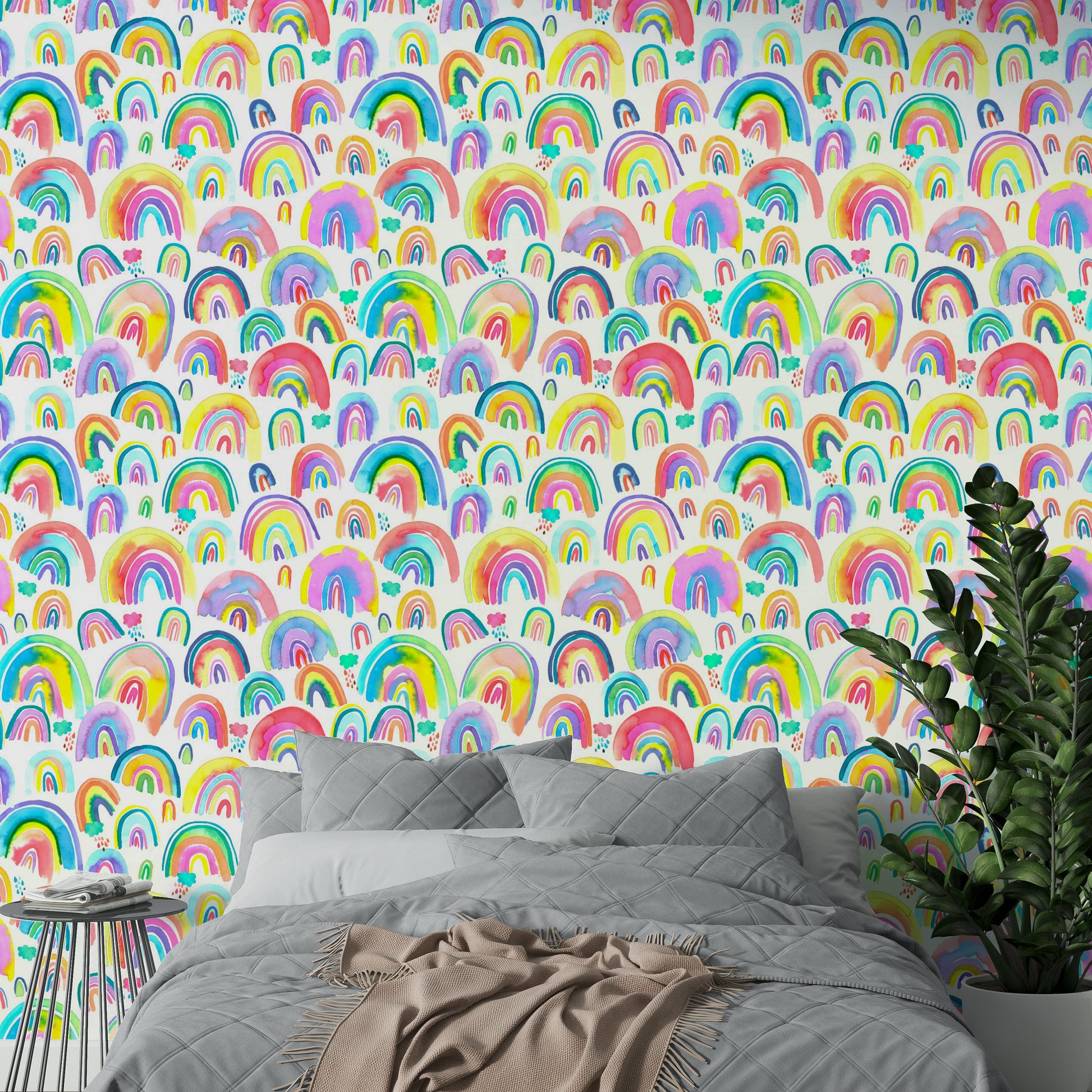 Wallpaper with playful rainbow curves in bold pink, blue, and yellow.

