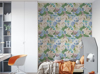 Romantic rose and hydrangea mural behind bed


