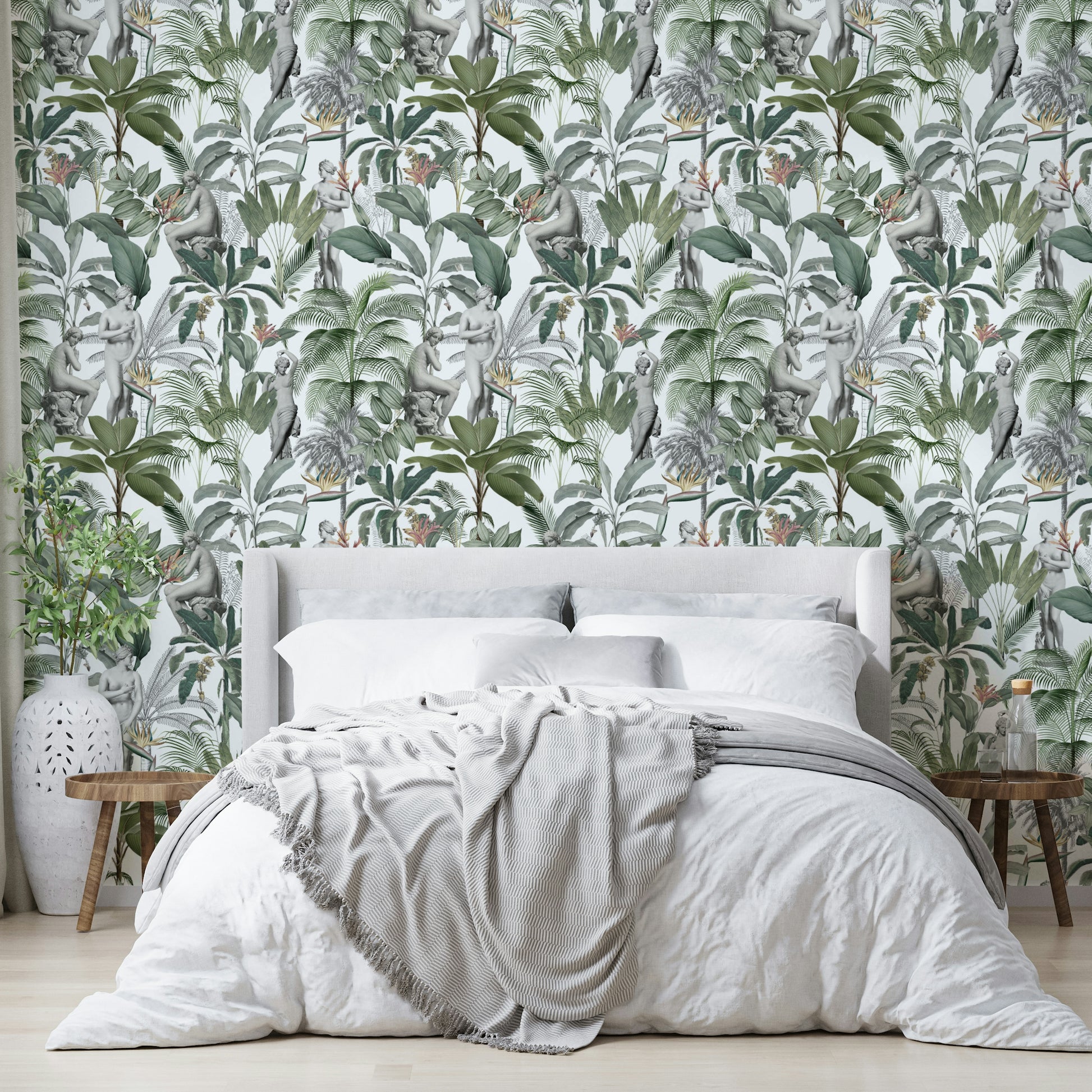 Tropical-inspired wallpaper with sculptural elements and rich greens

