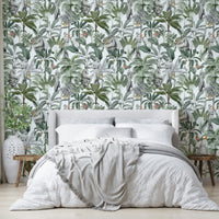 Tropical-inspired wallpaper with sculptural elements and rich greens

