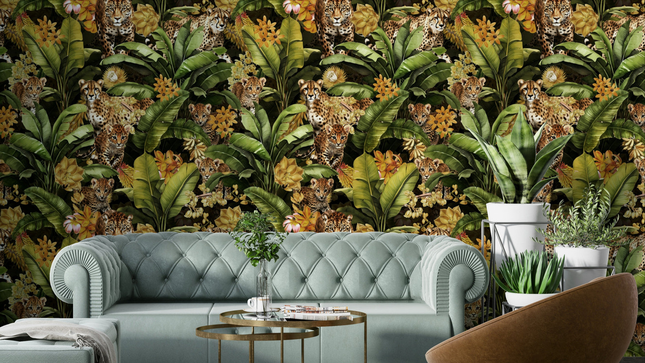 Wallpaper with tropical leaves, vines, and animals set against a golden background.

