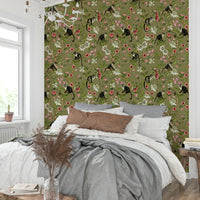 Close-up of tropical leaves and vines in a tranquil, jungle-inspired wallpaper.

